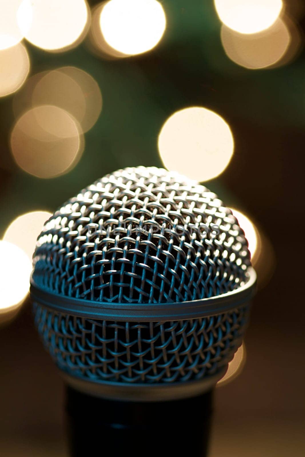 On stage microphone of a popular artist with spot lights