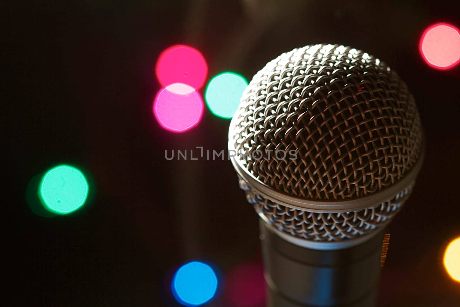 On stage microphone of a popular artist with spot lights