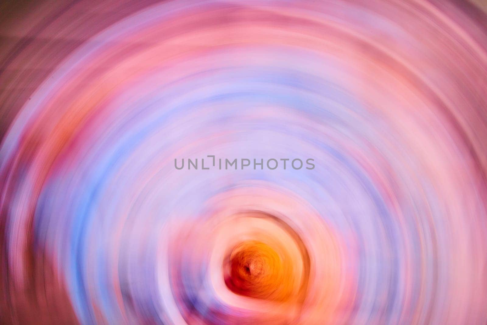 Image of Abstract soft pink sunset dome around artistic blur of golden red sun