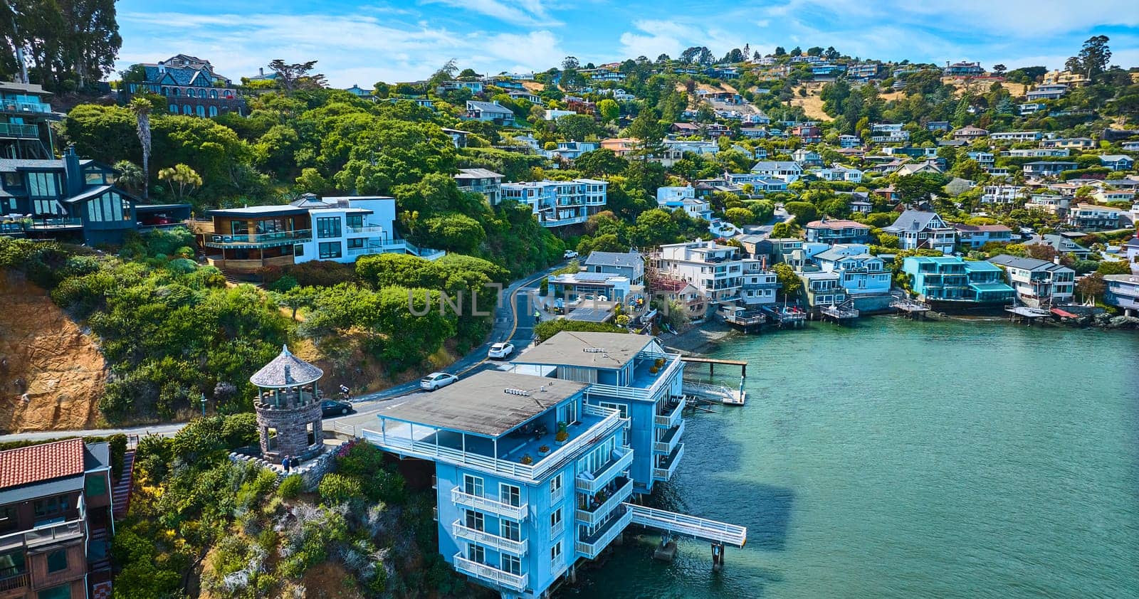Image of Lyfords Stone Tower aerial Tiburon waterfront properties on Lyford Cove of city on hillside