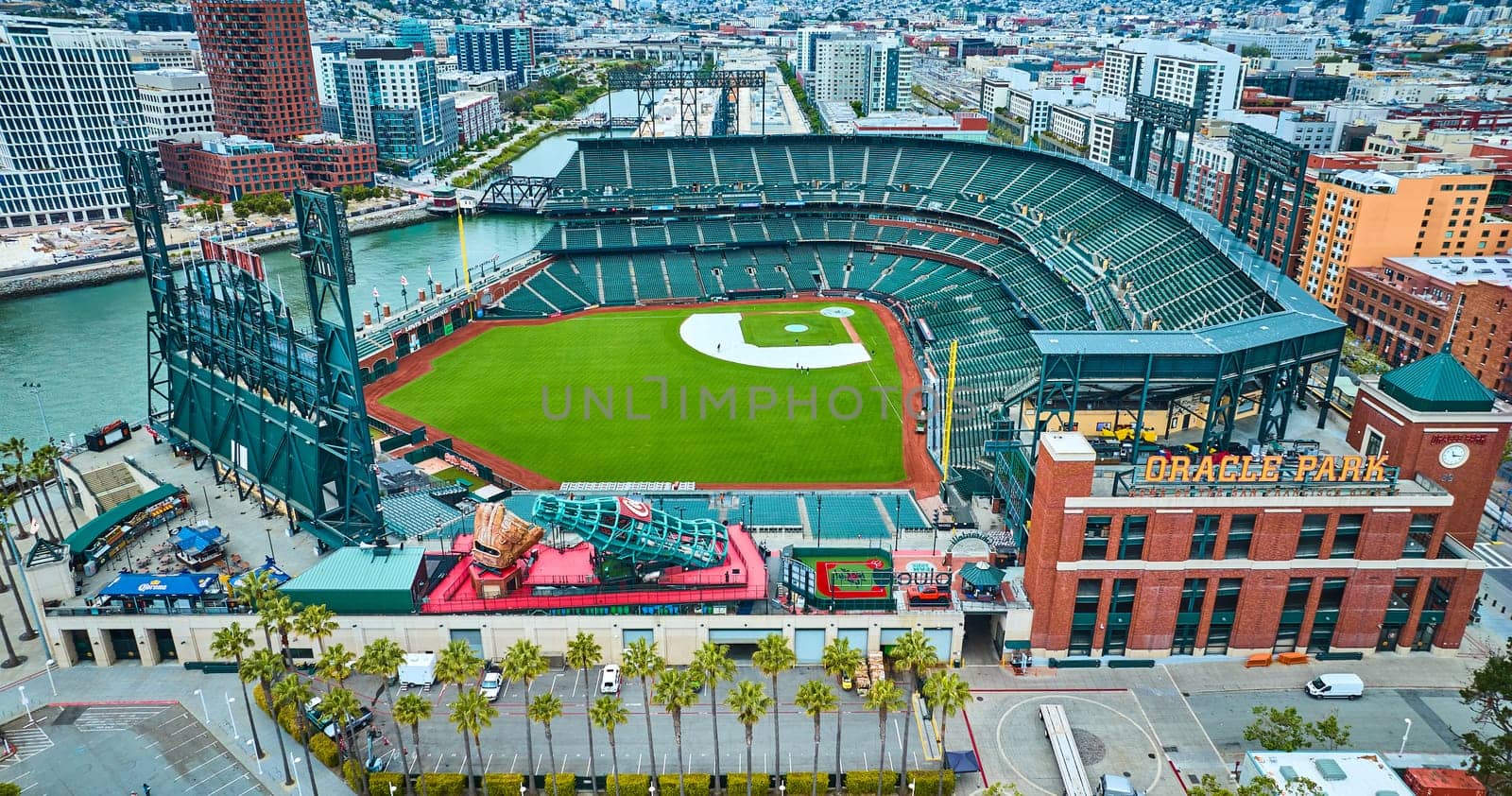 Image of Aerial Oracle Park Coca Cola slide with people on giants baseball diamond field