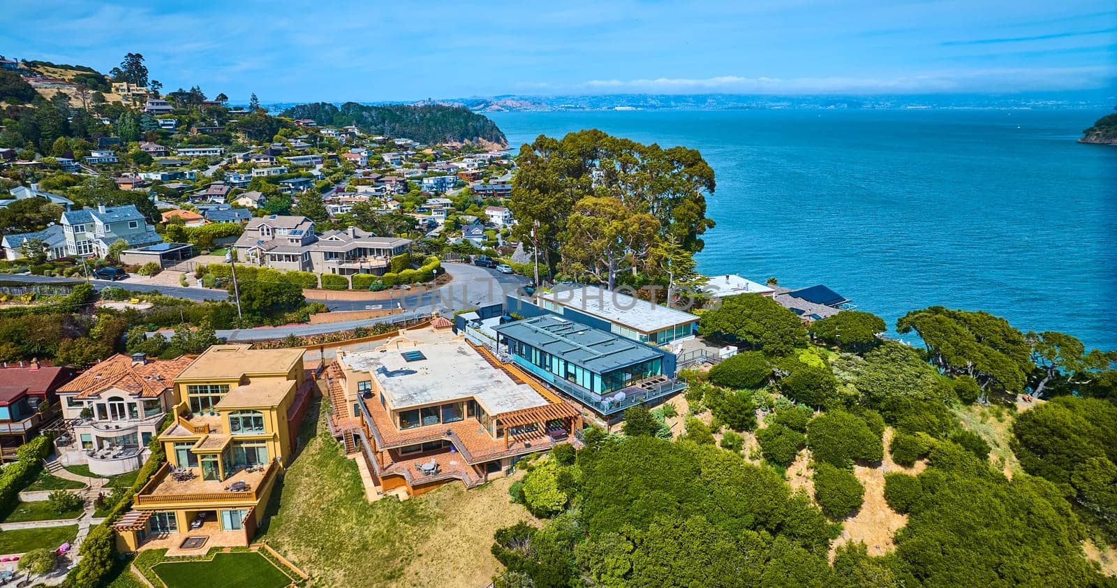 Image of Aerial Tiburon rich houses on hillside overlooking Lyford Cove and distant shoreline