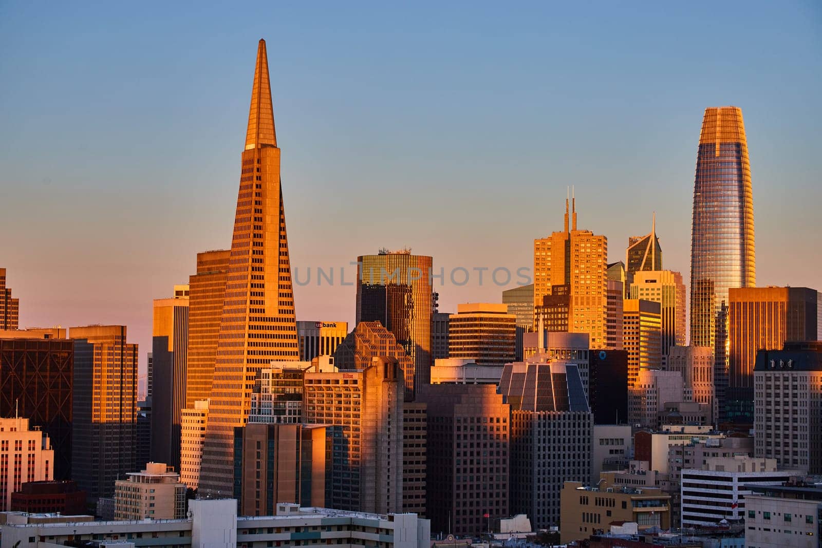 Image of Golden sunset lighting hitting downtown San Francisco skyscrapers