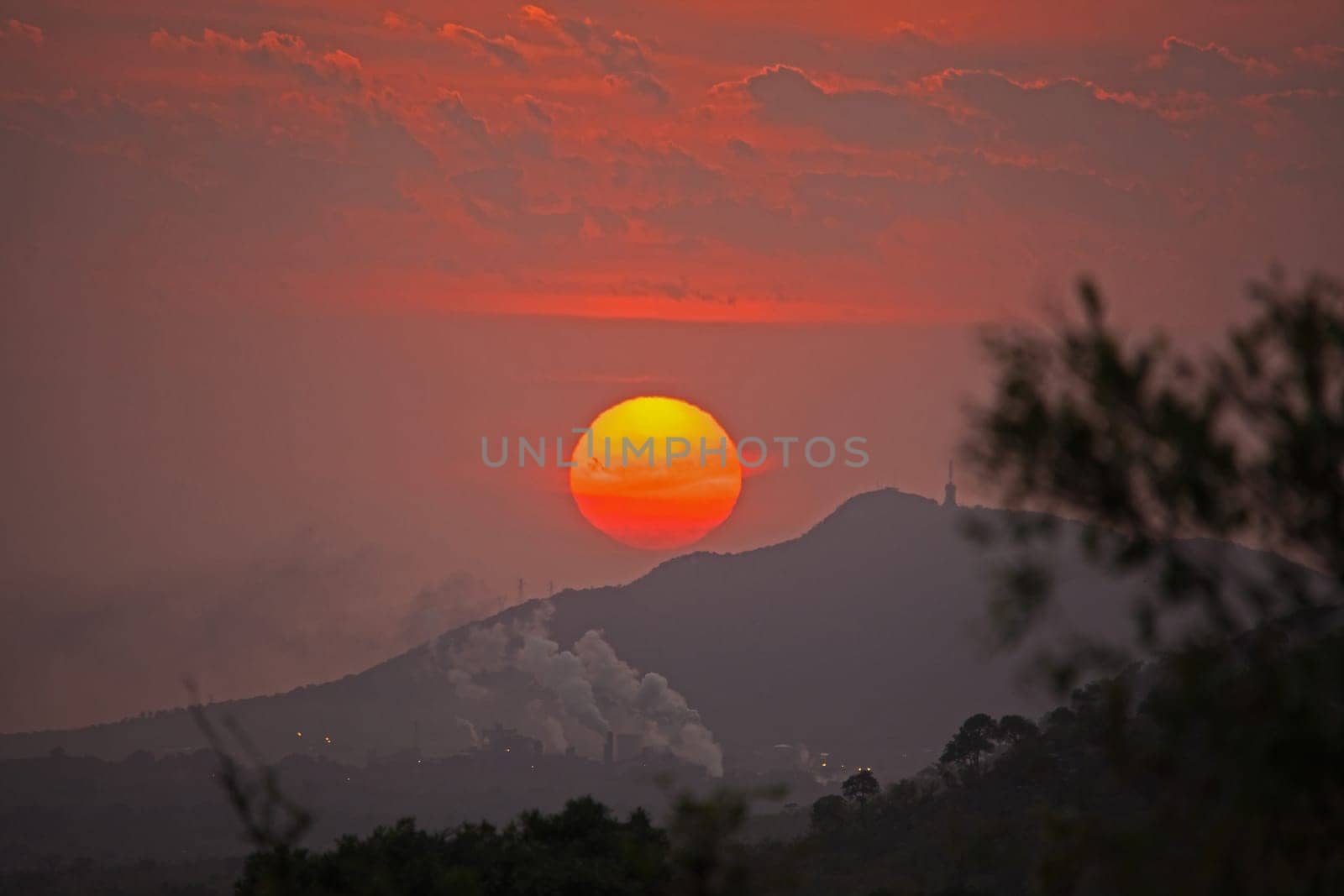 Suger mill near Malelane, Mpumalanga Province, as een at sunrise from Kruger National Park, South Africa