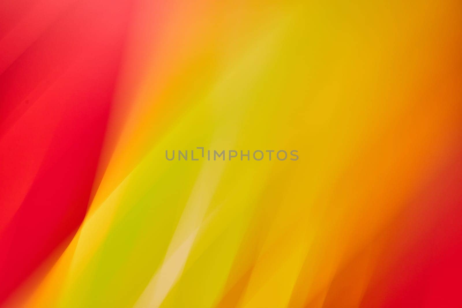 Image of Abstract yellow flame ending in orange and framed by red on two corners abstract background asset