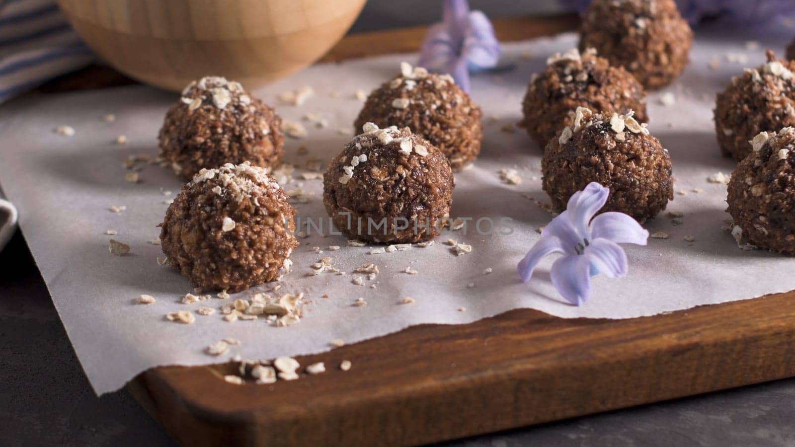 Homemade fresh energy balls with chocolate.