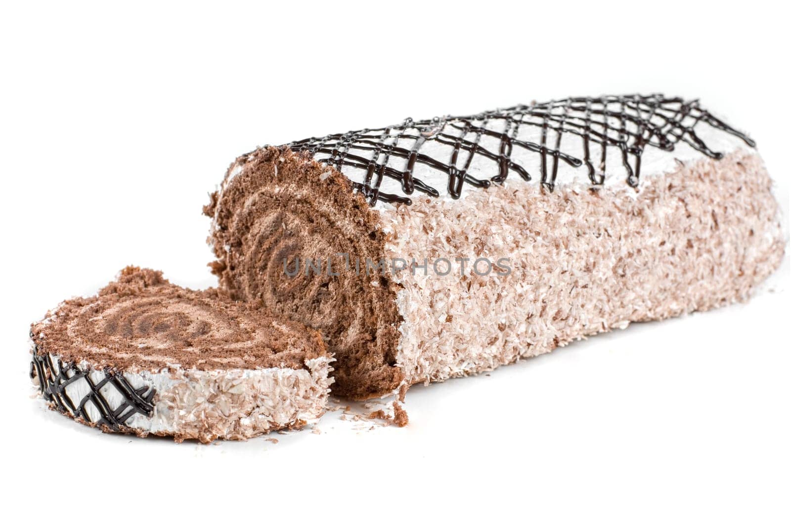 Chocolate Swiss roll closeup isolated on a white background