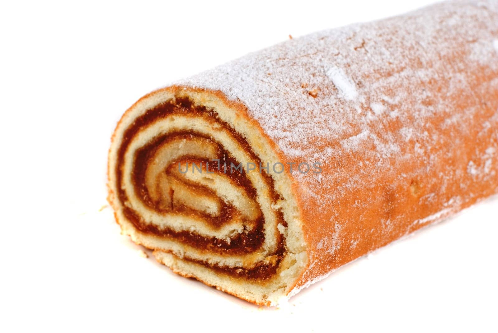 Swiss roll closeup isolated on a white background