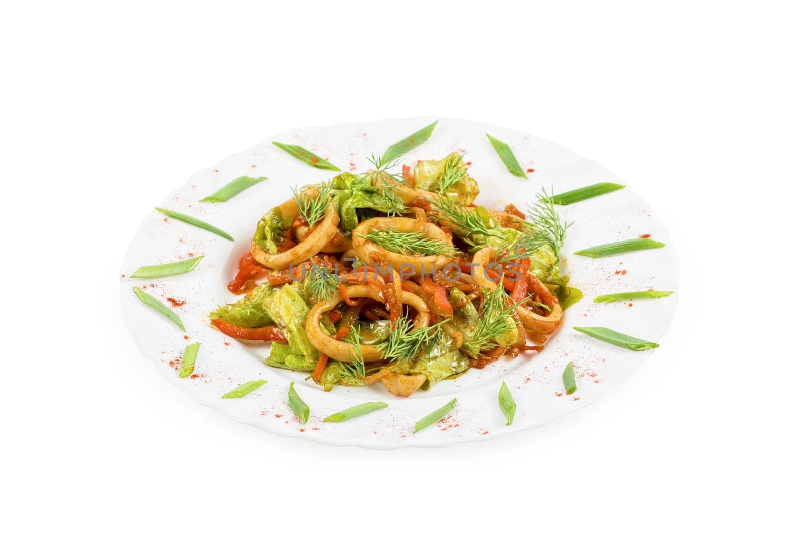 Seafood salad with squid and vegetables closeup