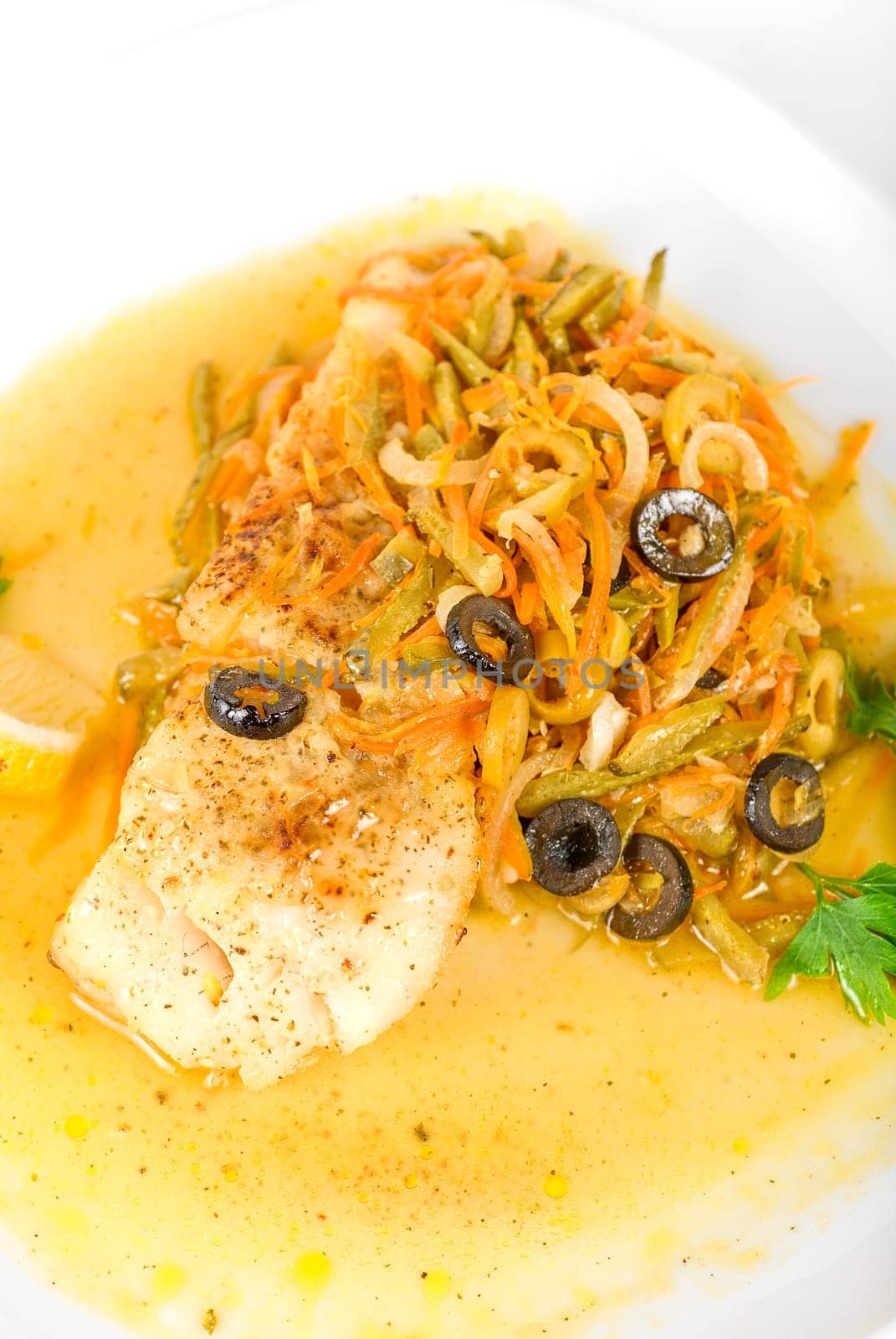 Tasty fish pike perch with mix of vegetables
