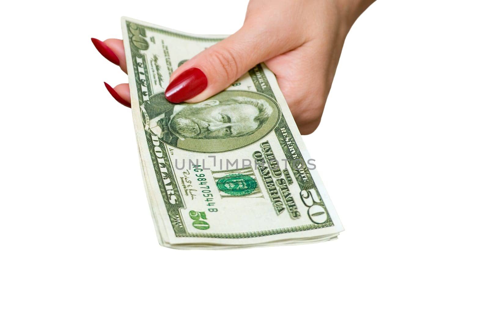 The female hand holds some denominations on 50 dollars