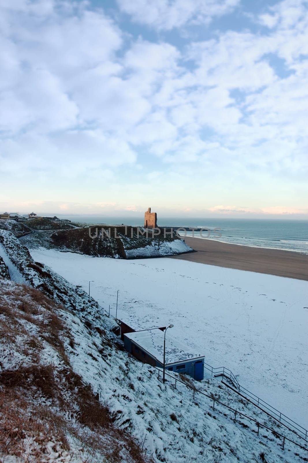 a snowy coastal scene in ballybunion ireland