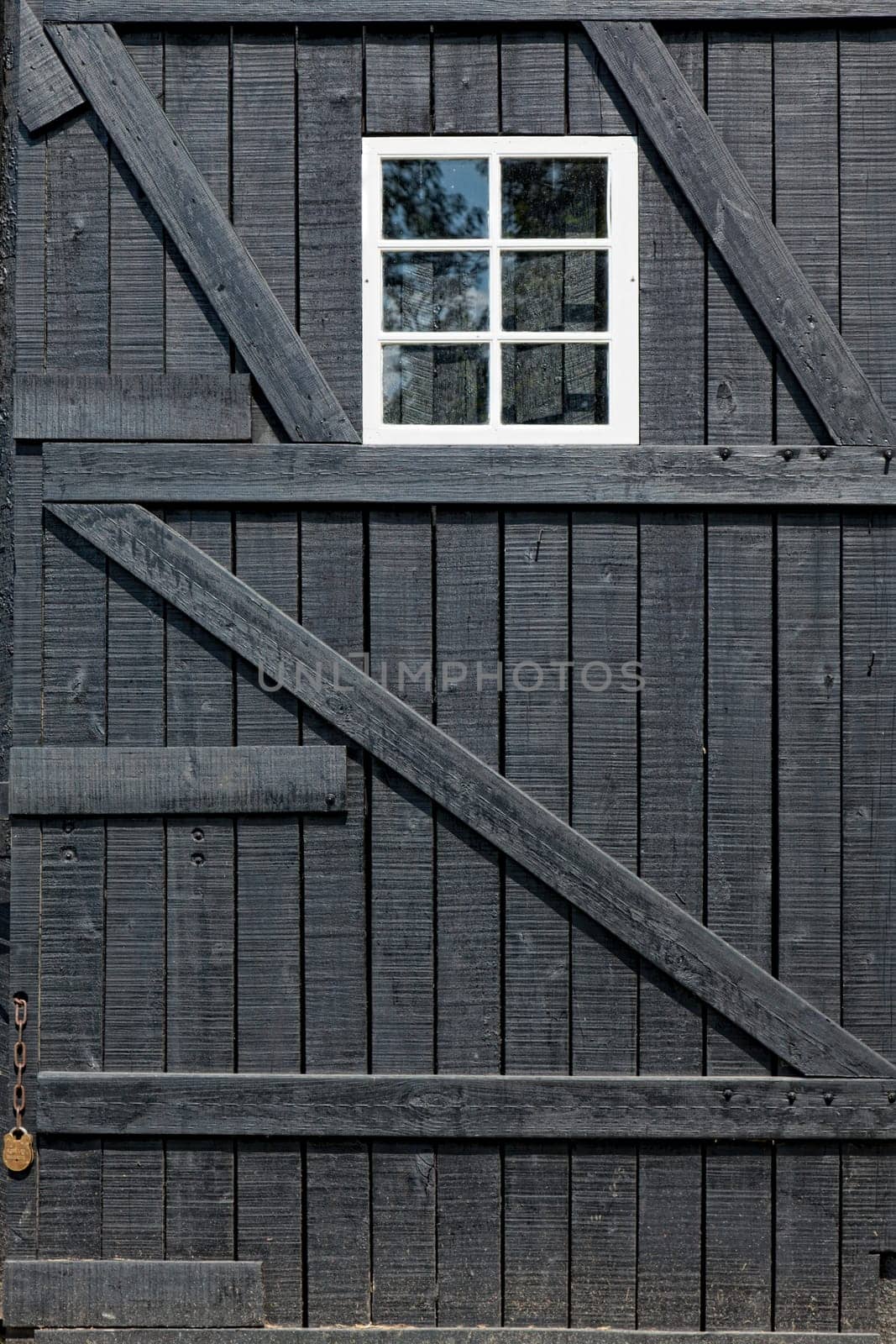 Detailed view of a barn door and window