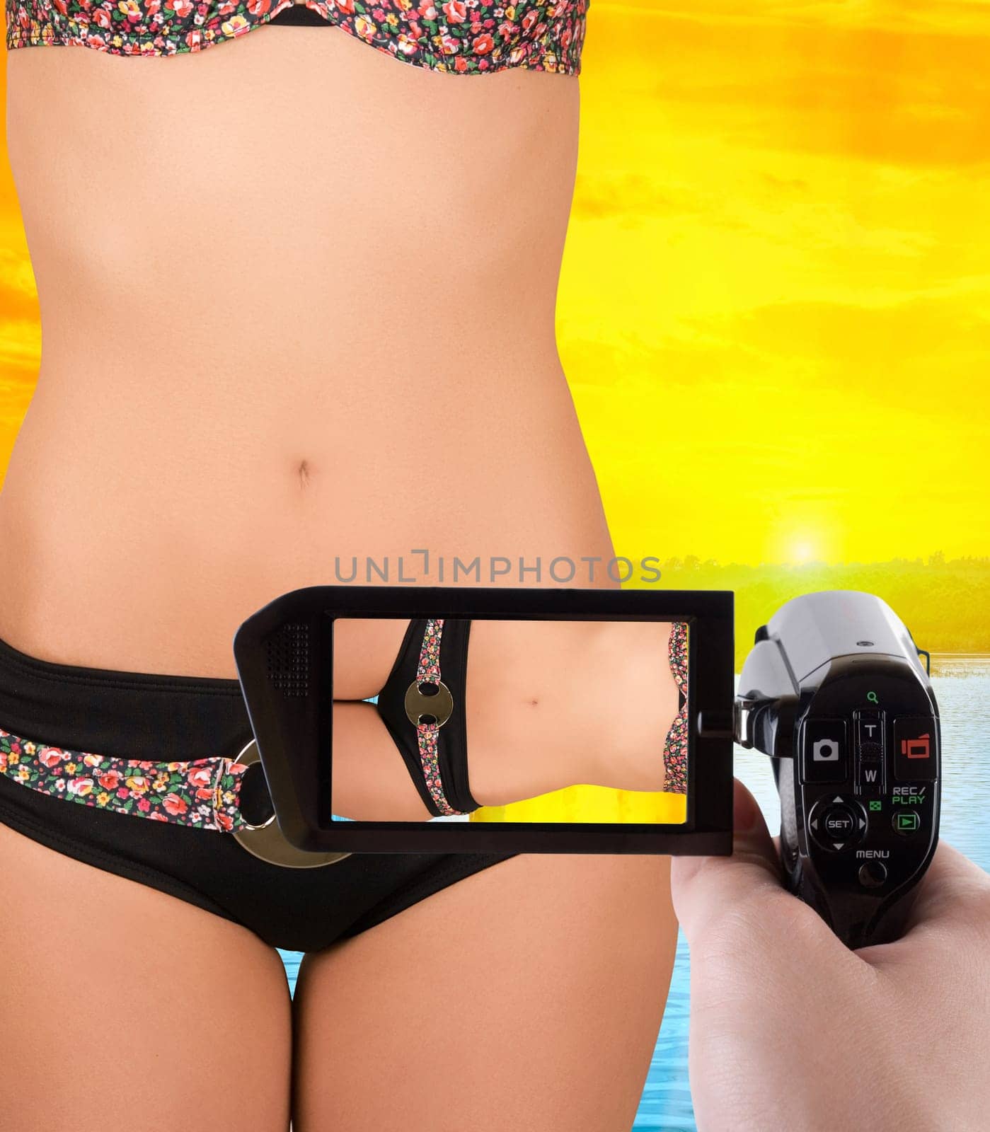 beautiful woman closeup over beauty sea background recording to camcorder