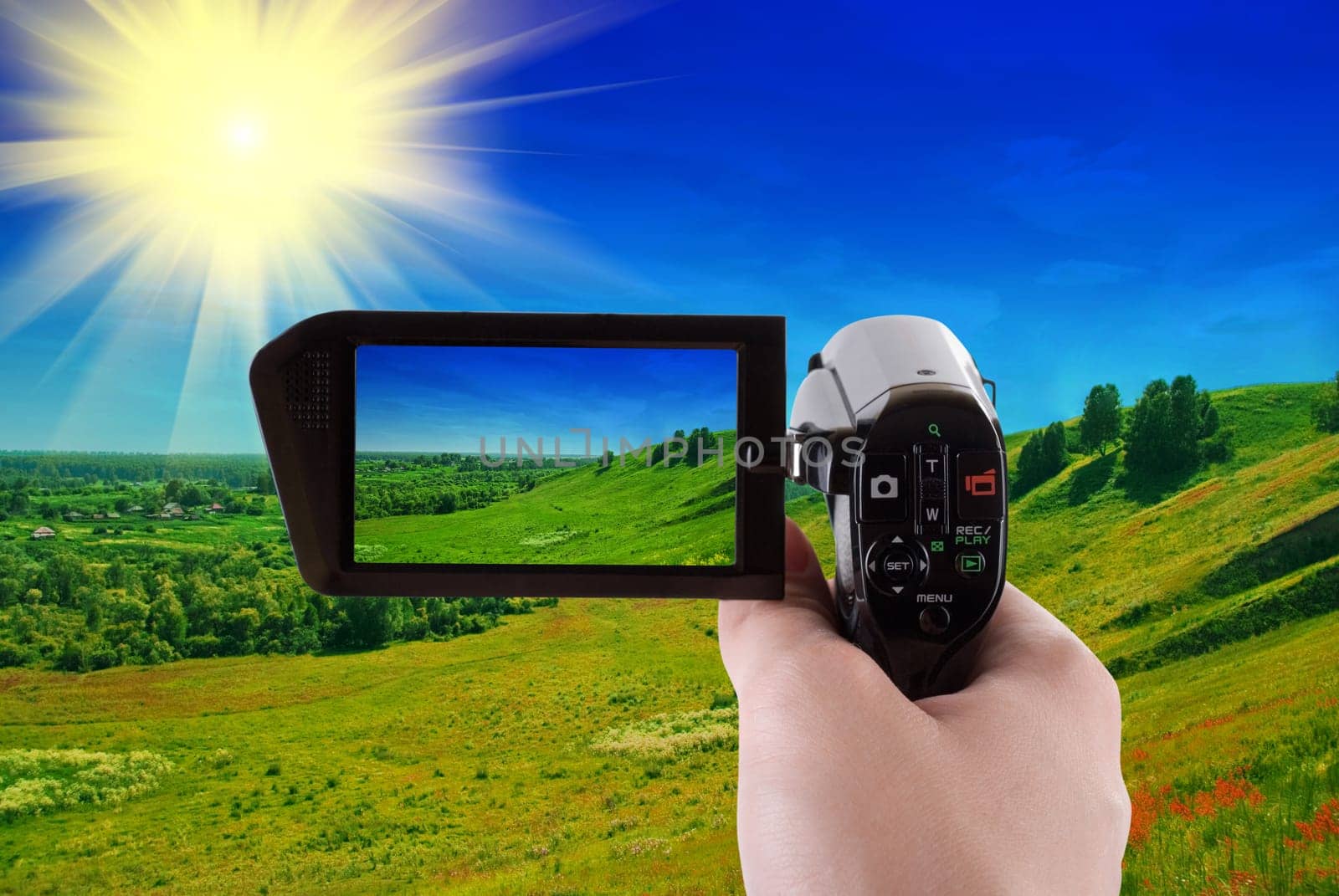 summer landscape of green valley recording at camcorder