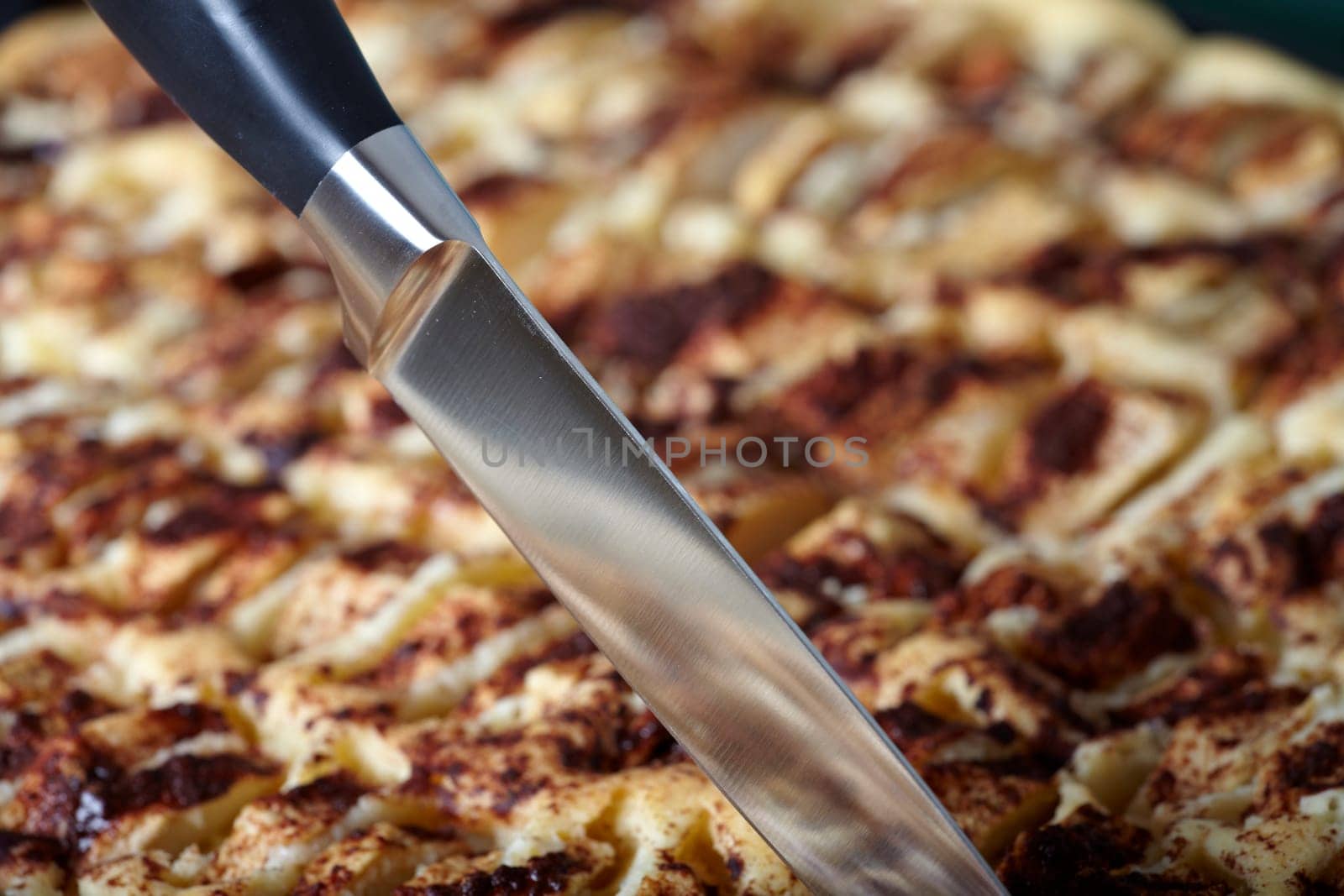 Apple pie on baking sheet