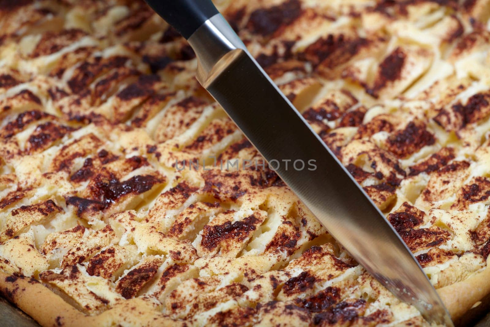 Apple pie on baking sheet