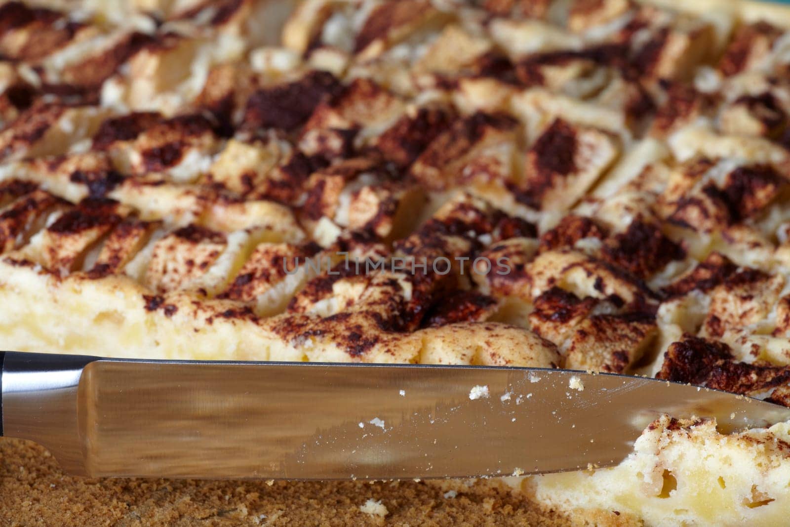 Apple pie on baking sheet