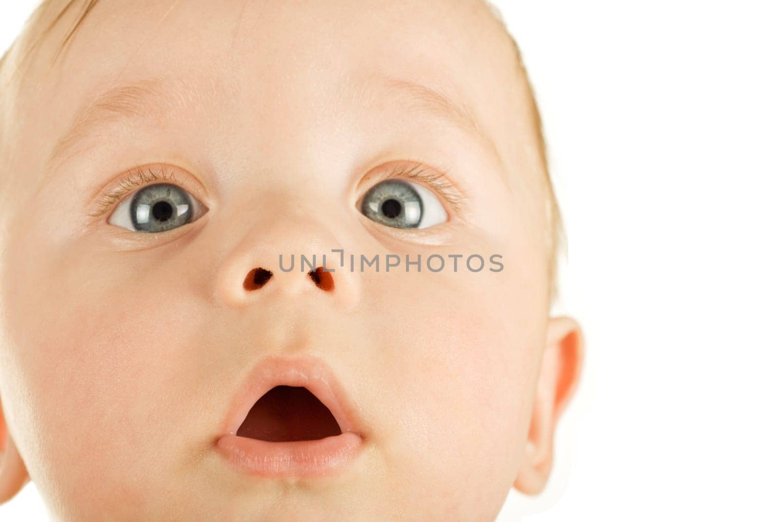 baby boy closeup portrait on a white