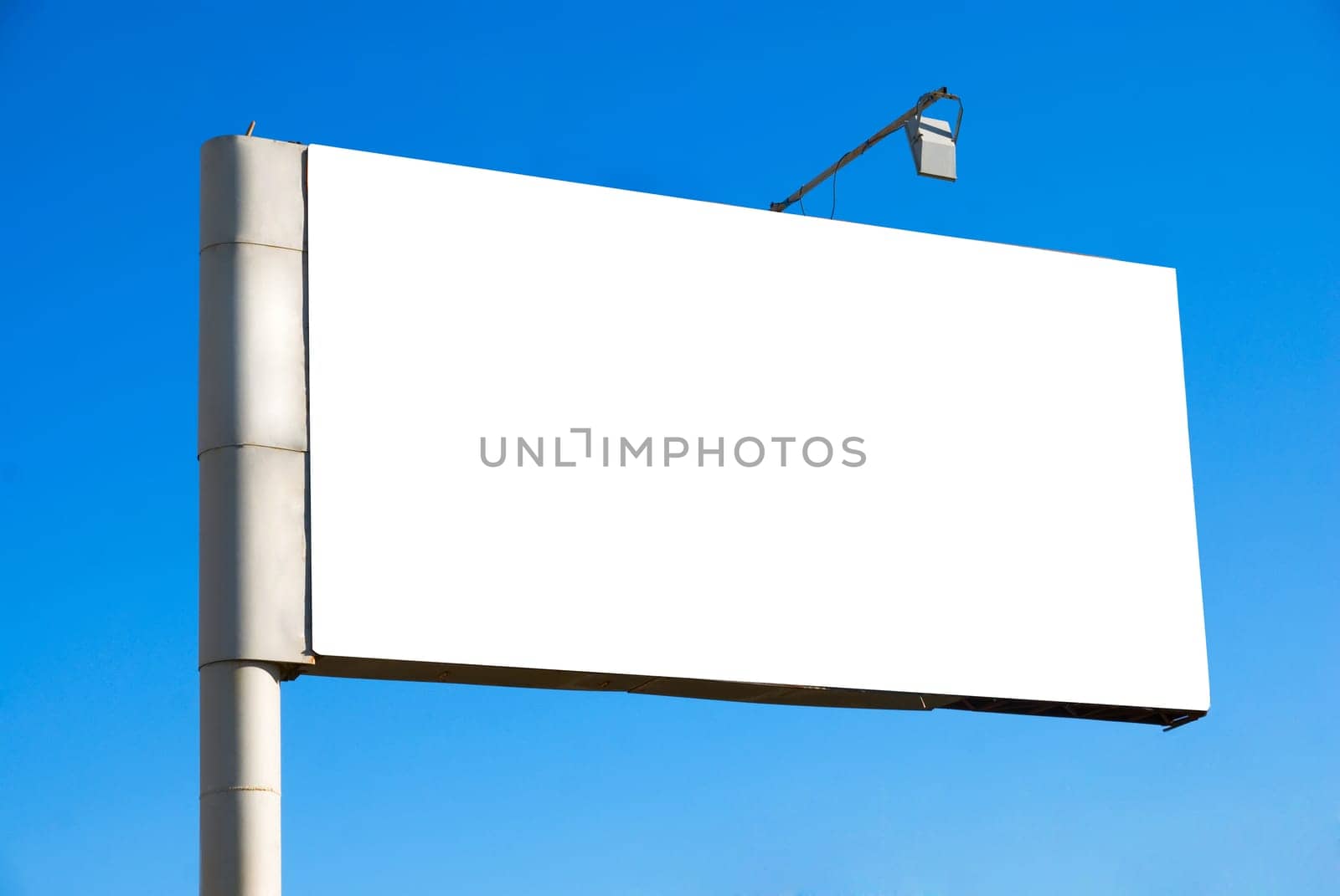 Blank billboard over blue sky background