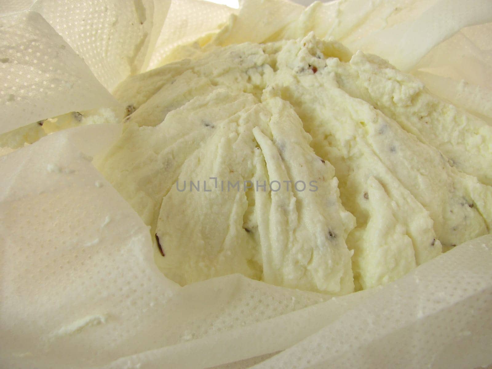 Fresh curd in a cloth
