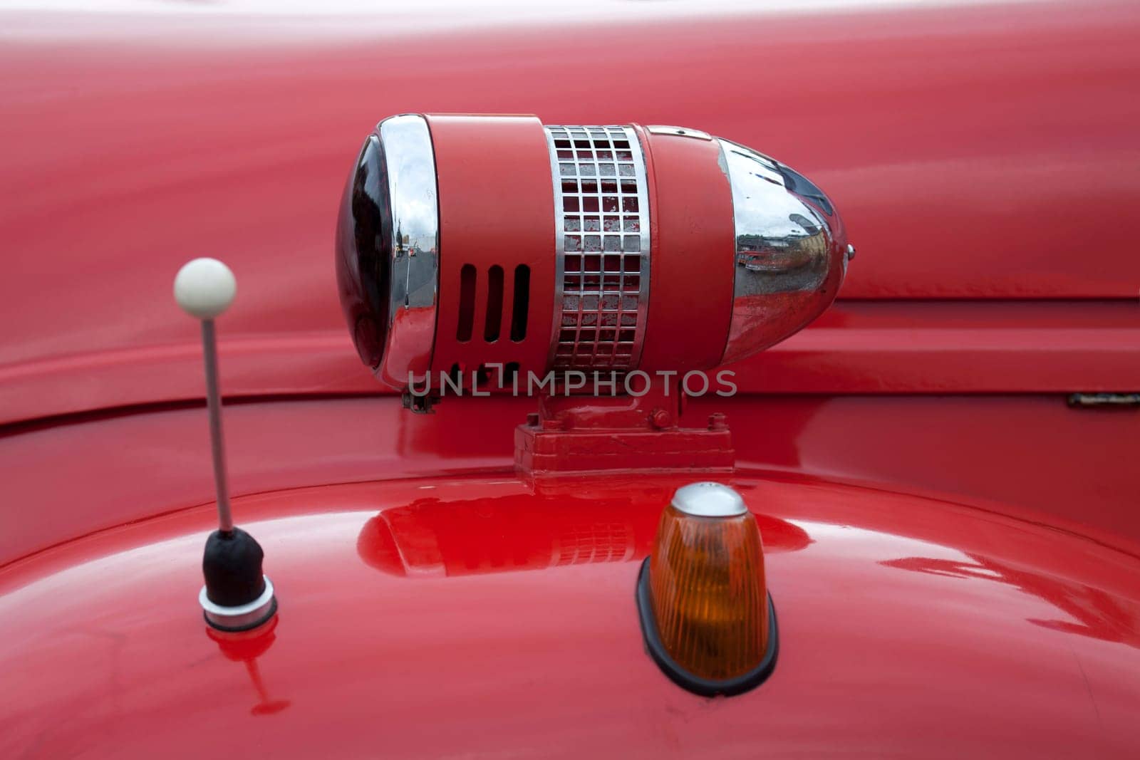 Close-up of red vintage car
