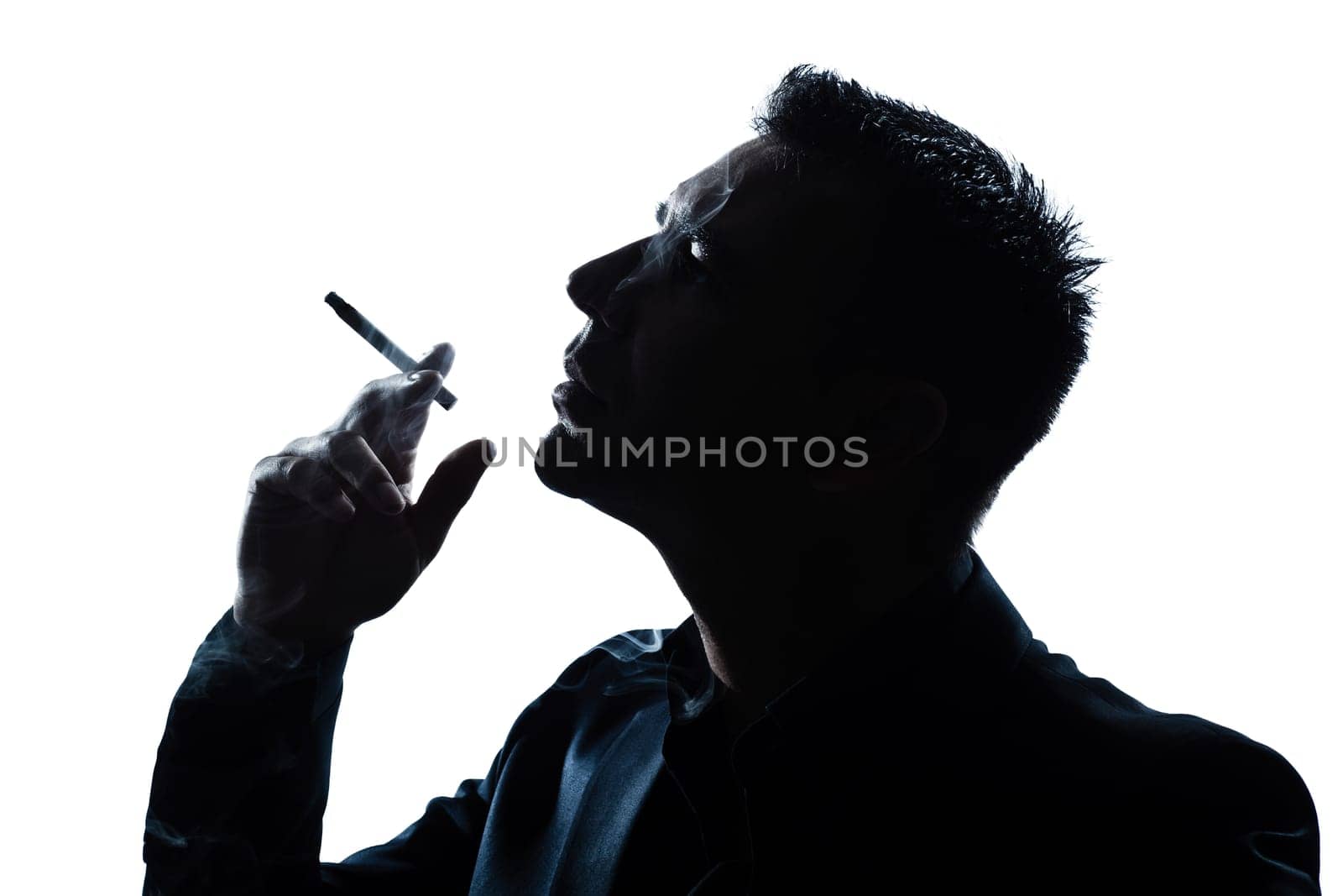 one caucasian man portrait smoking cigarette silhouette in studio isolated white background
