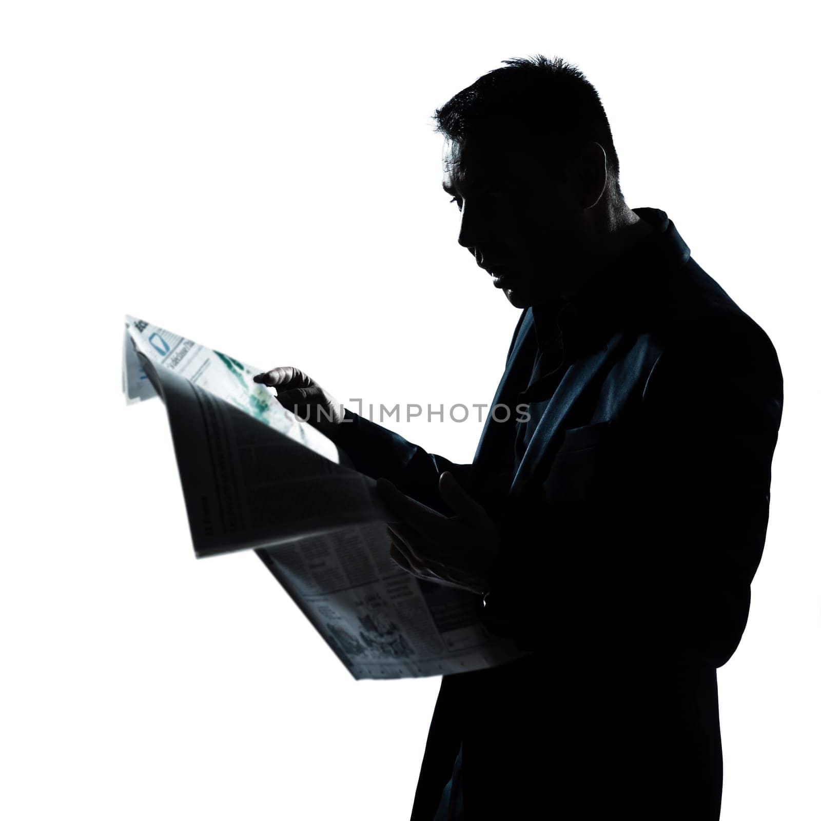 one caucasian man portrait silhouette reading newspaper surprised in studio isolated on white background