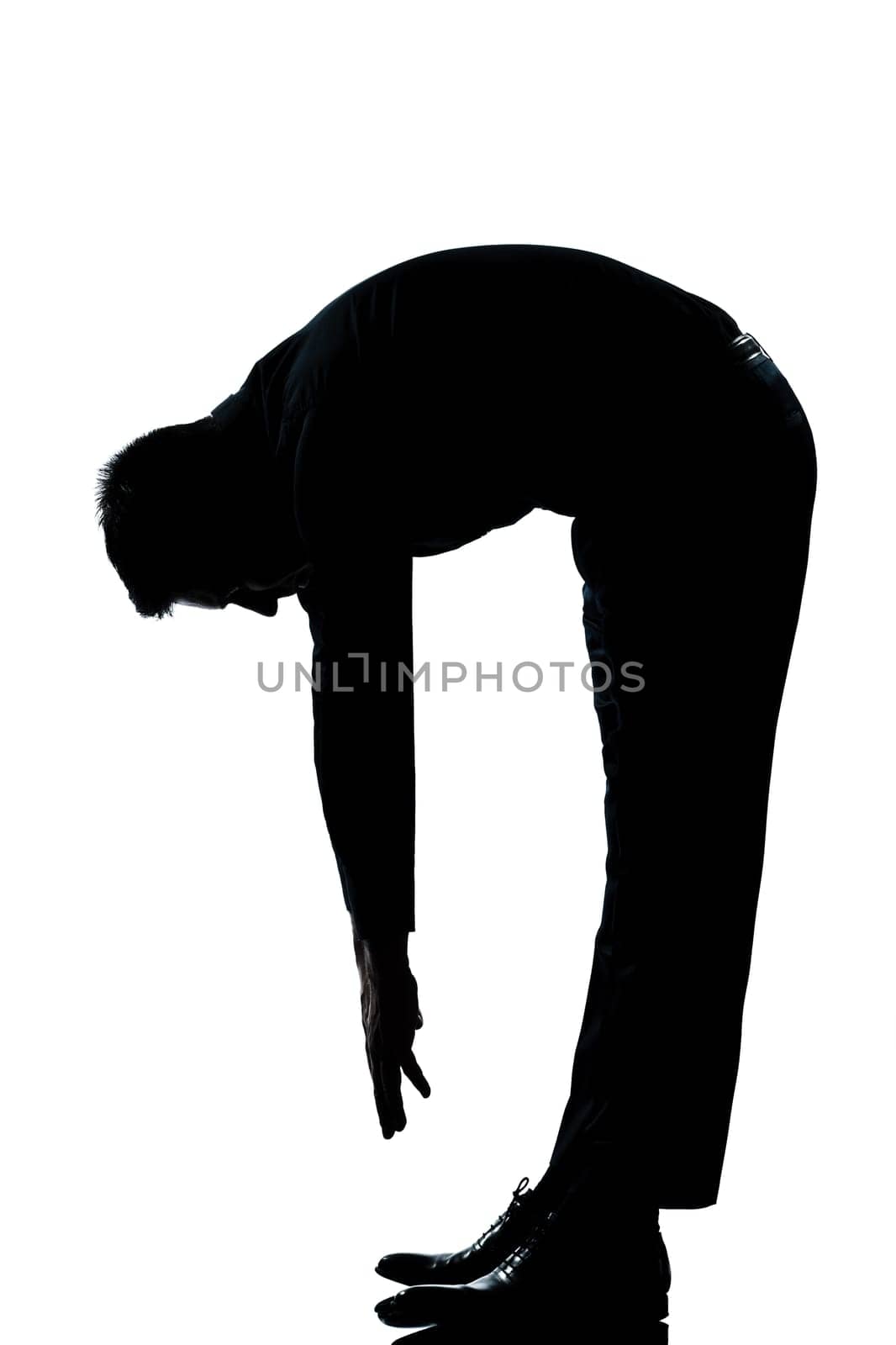 one caucasian man stretching back full length silhouette in studio isolated white background