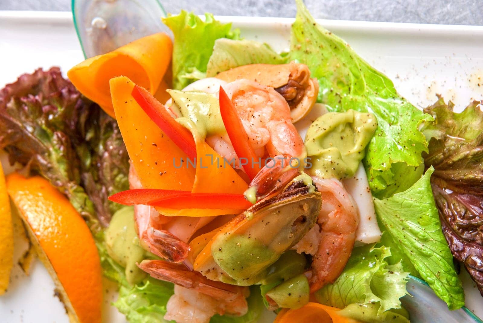 appetizer closeup dish of seafood and vegetables