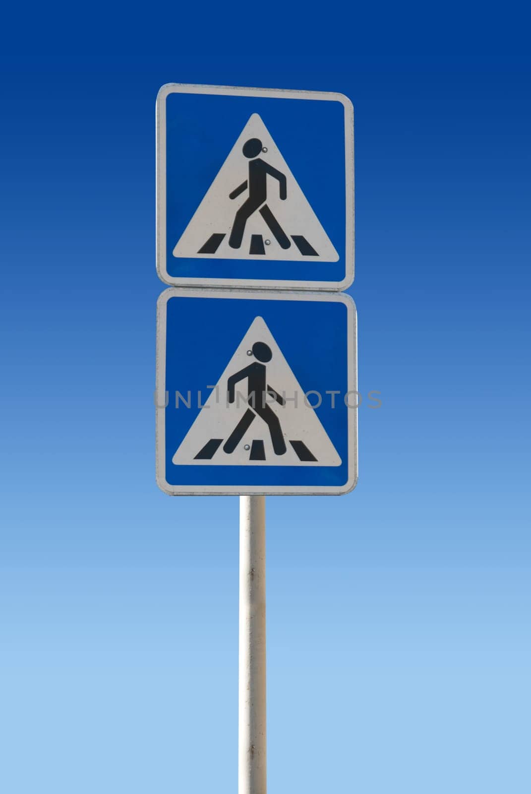 Two pedestrian Sign on a blue background