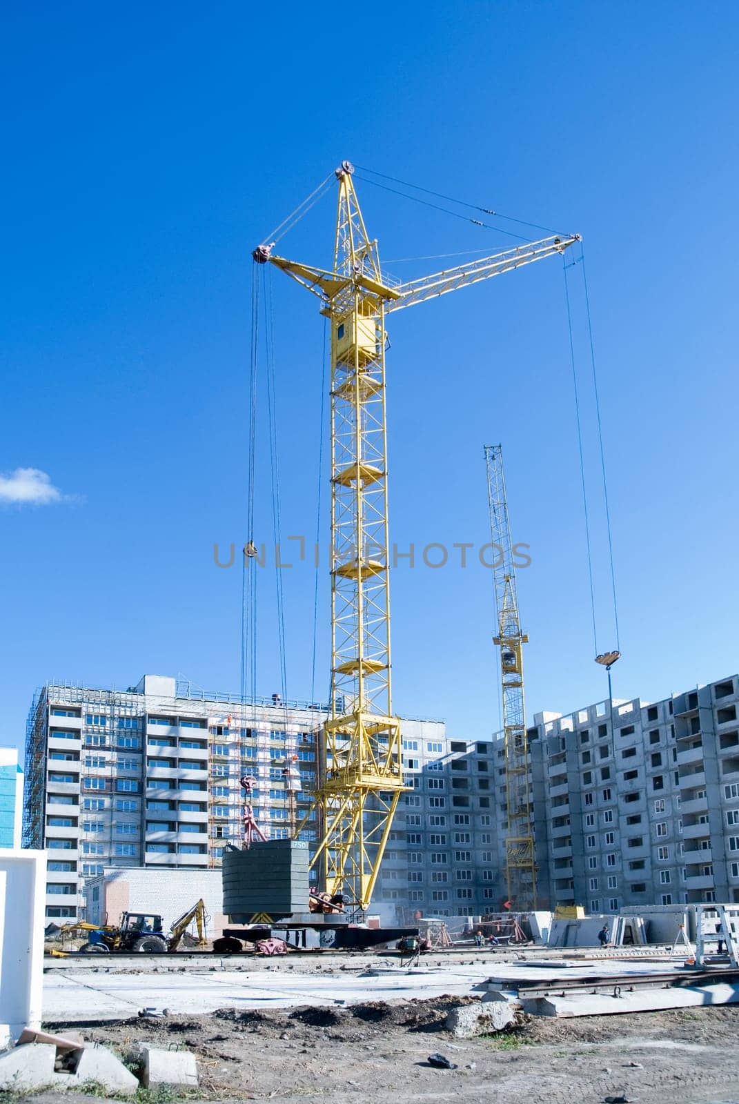 crane and building under construction on the skyline