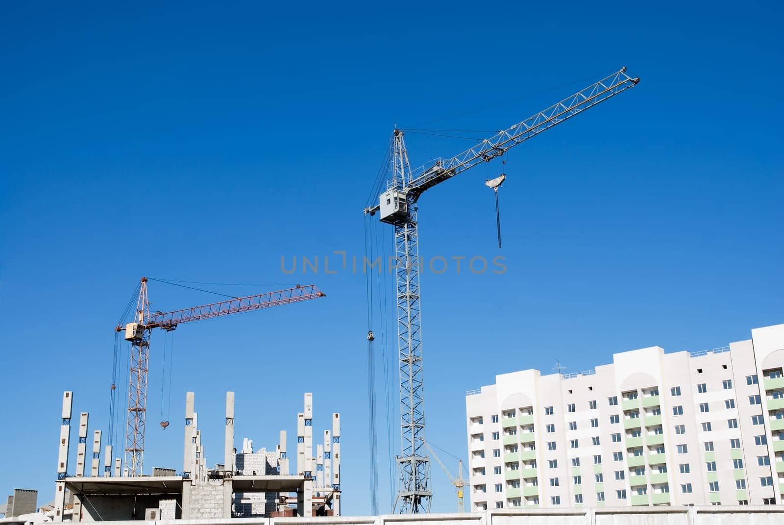 crane and building under construction on the skyline