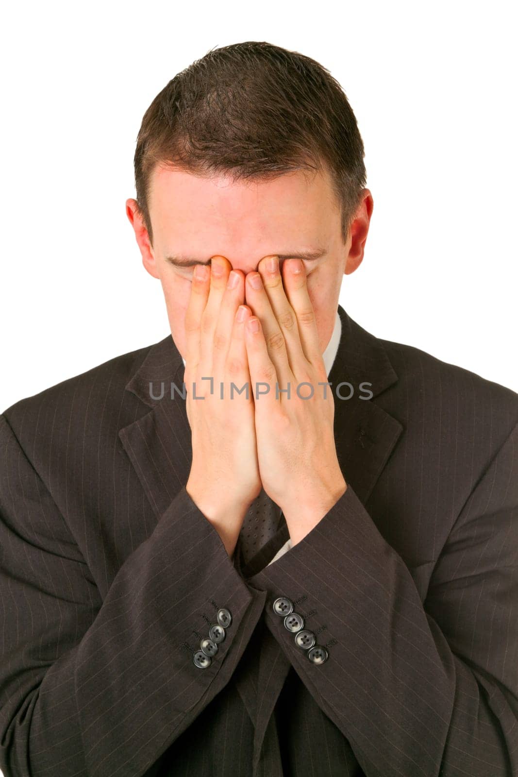 Man holding hands over his face - isolated on white background