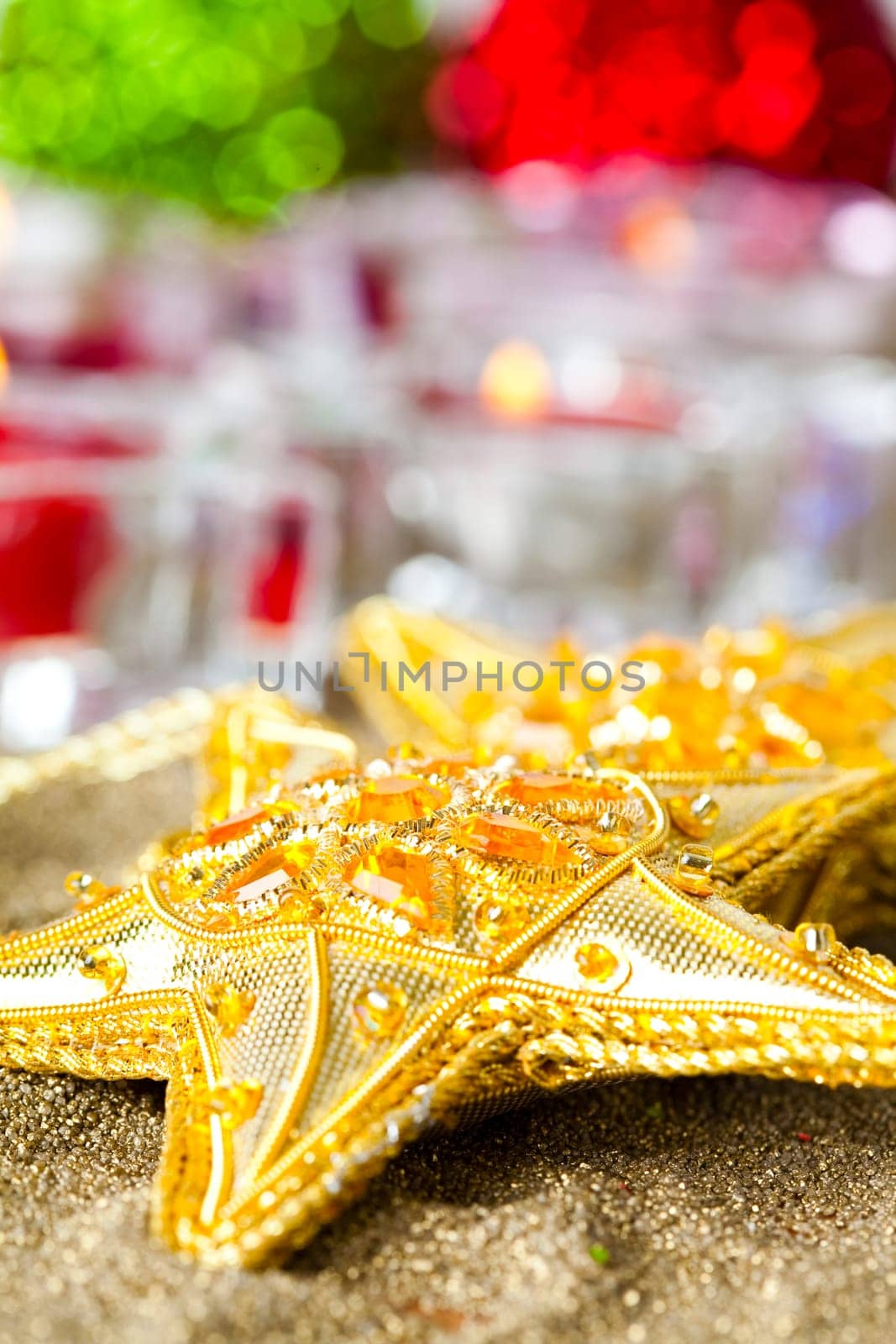 Close-up of star shape Christmas decorations with candles