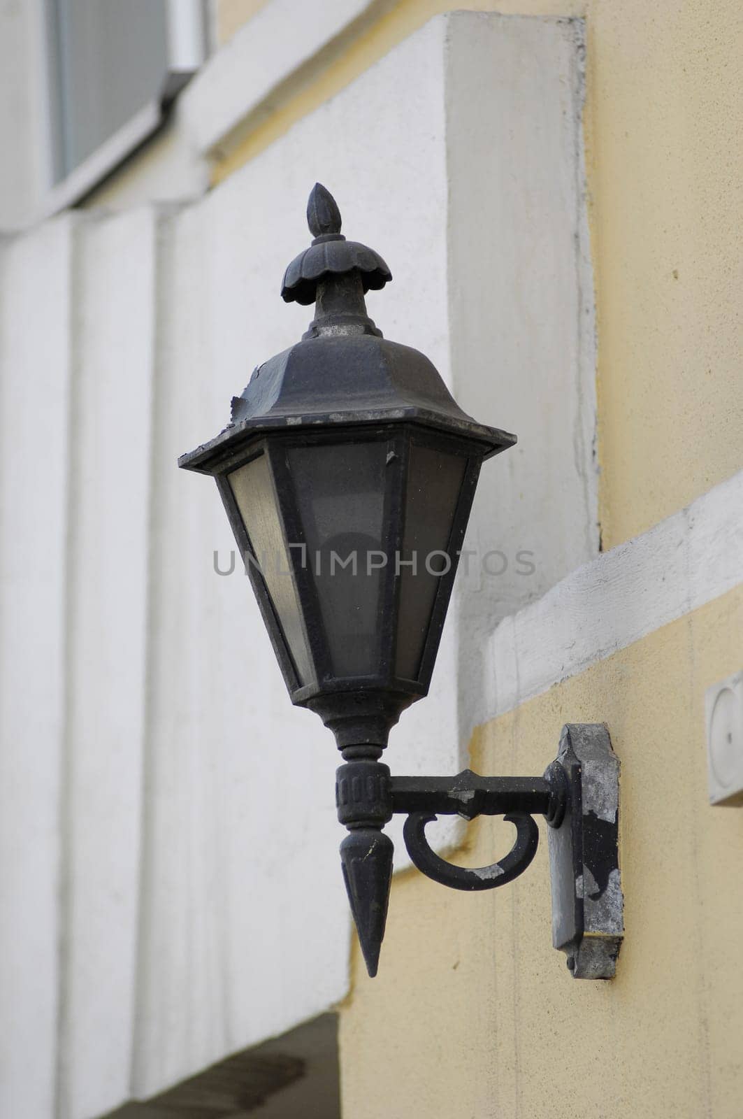 Street lighter on a building wall
