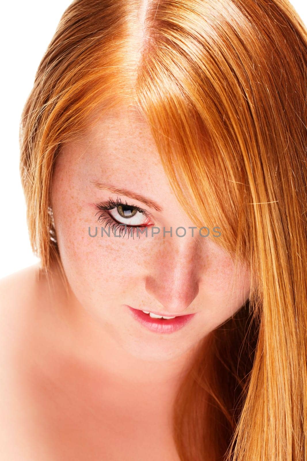 Young redhead woman with beautiful hair on white background