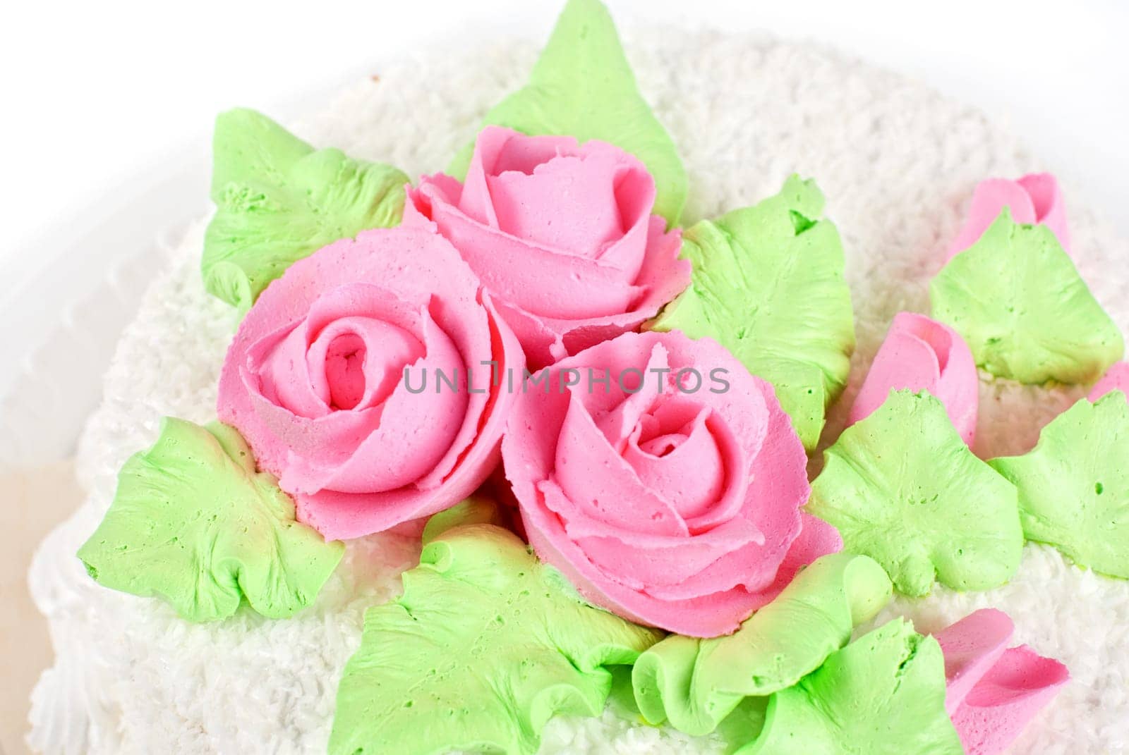 cream cake closeup with cherry on a grey