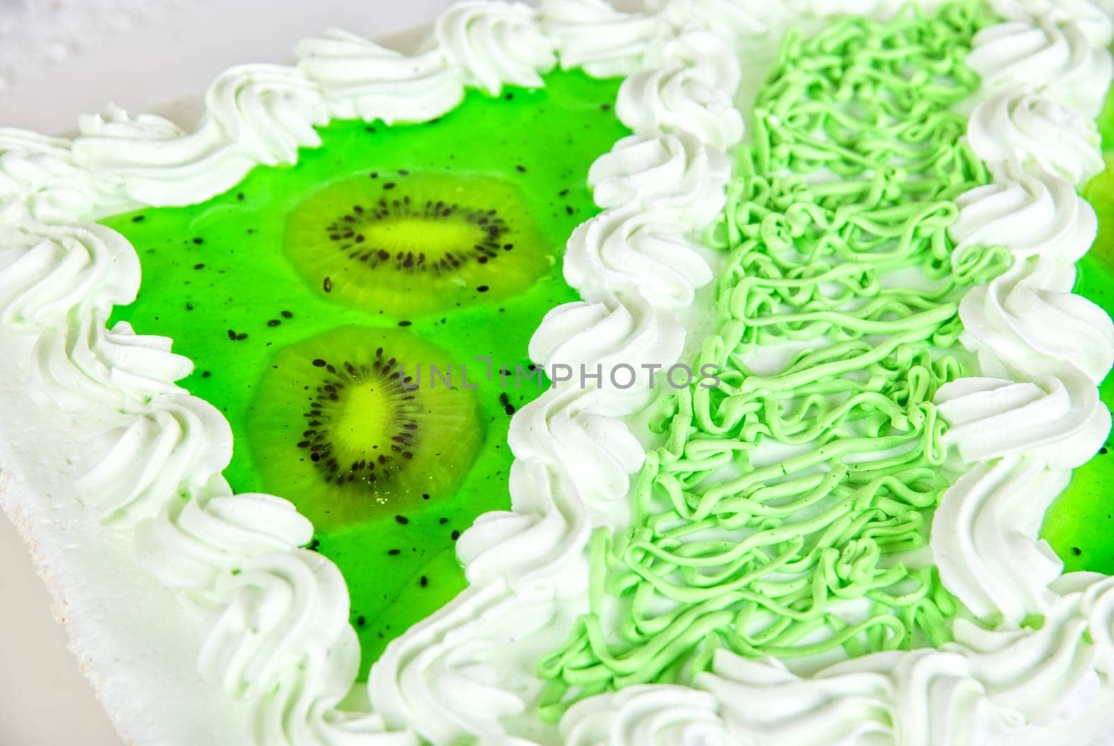 fruit kiwi cake closeup isolated on a white