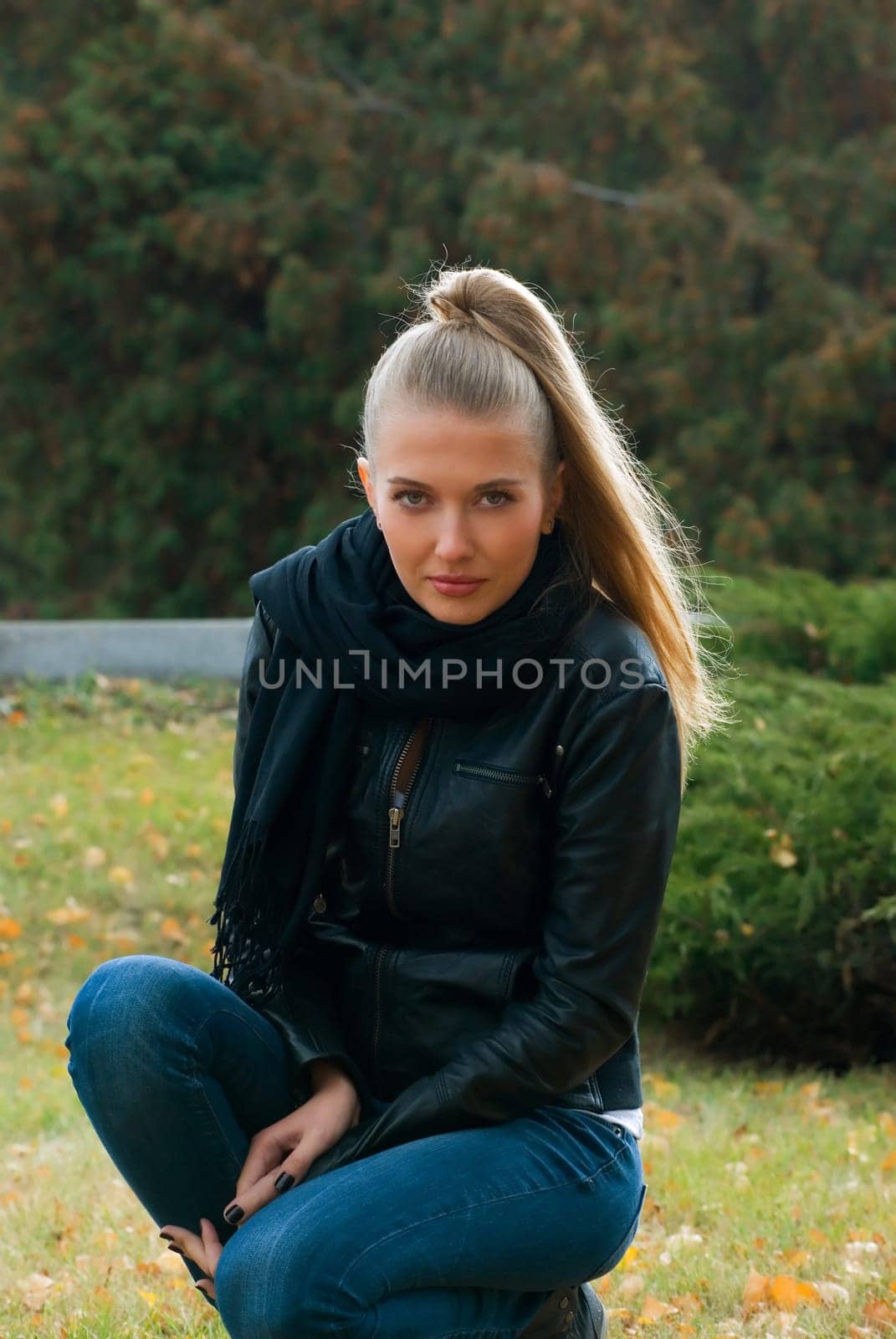 young beauty woman in autumn park portrait