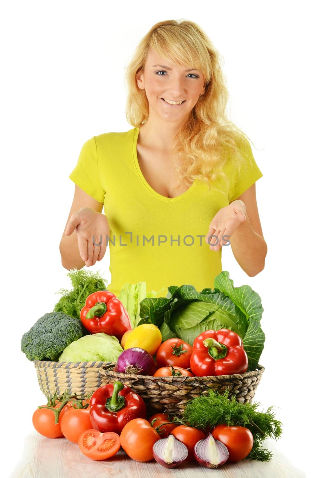 Young woman with groceries isolated on white