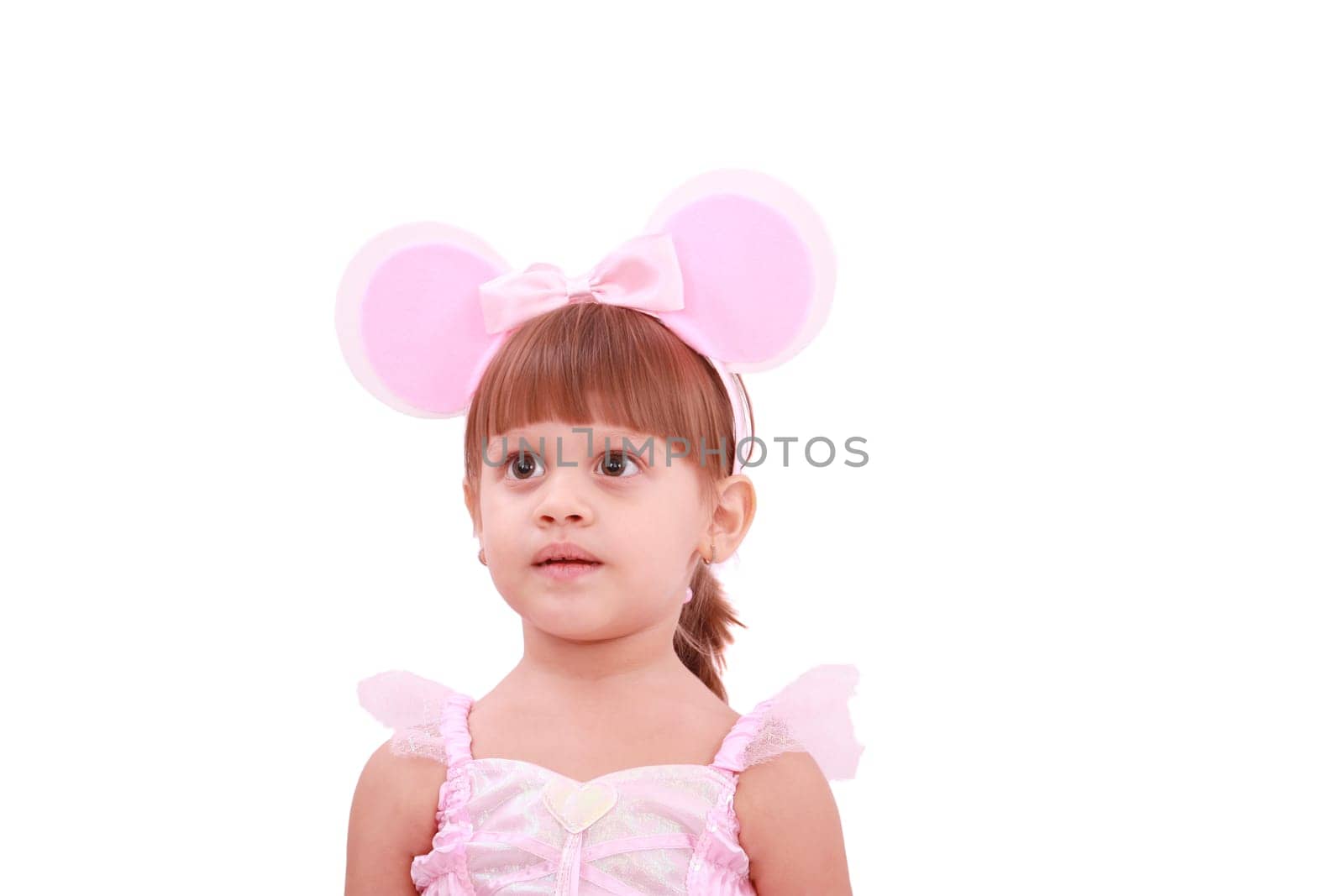 Portrait of a happy little girl wearing rabbit ears