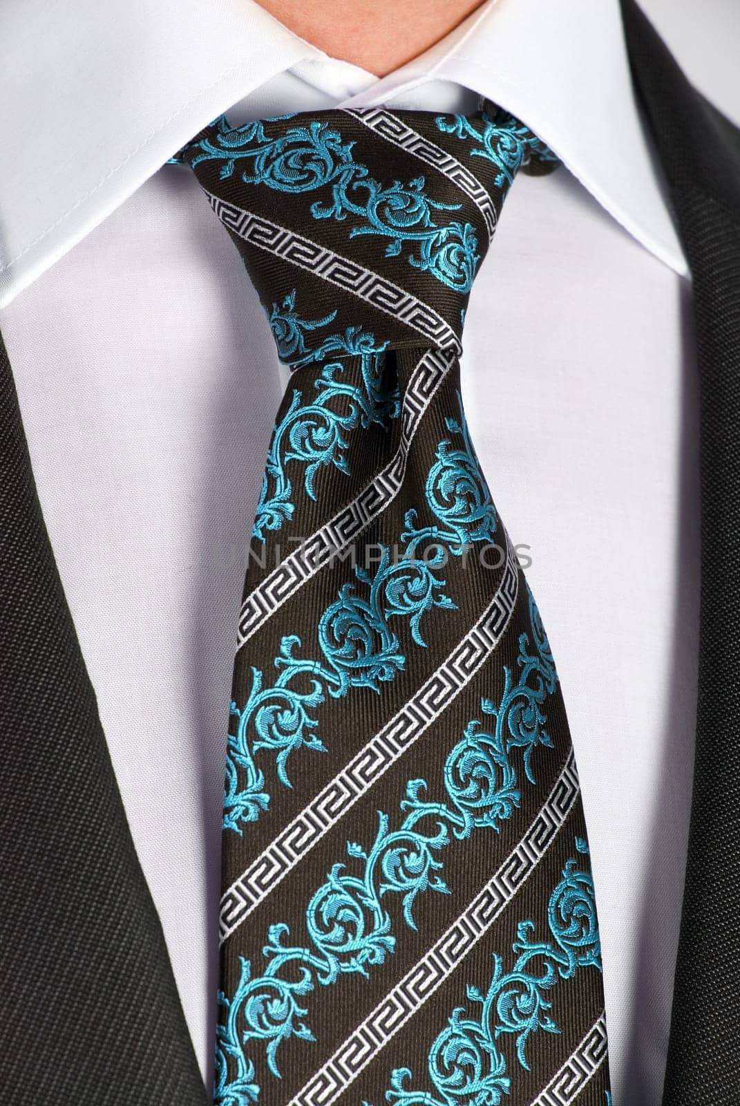 closeup of businessman suit with tie