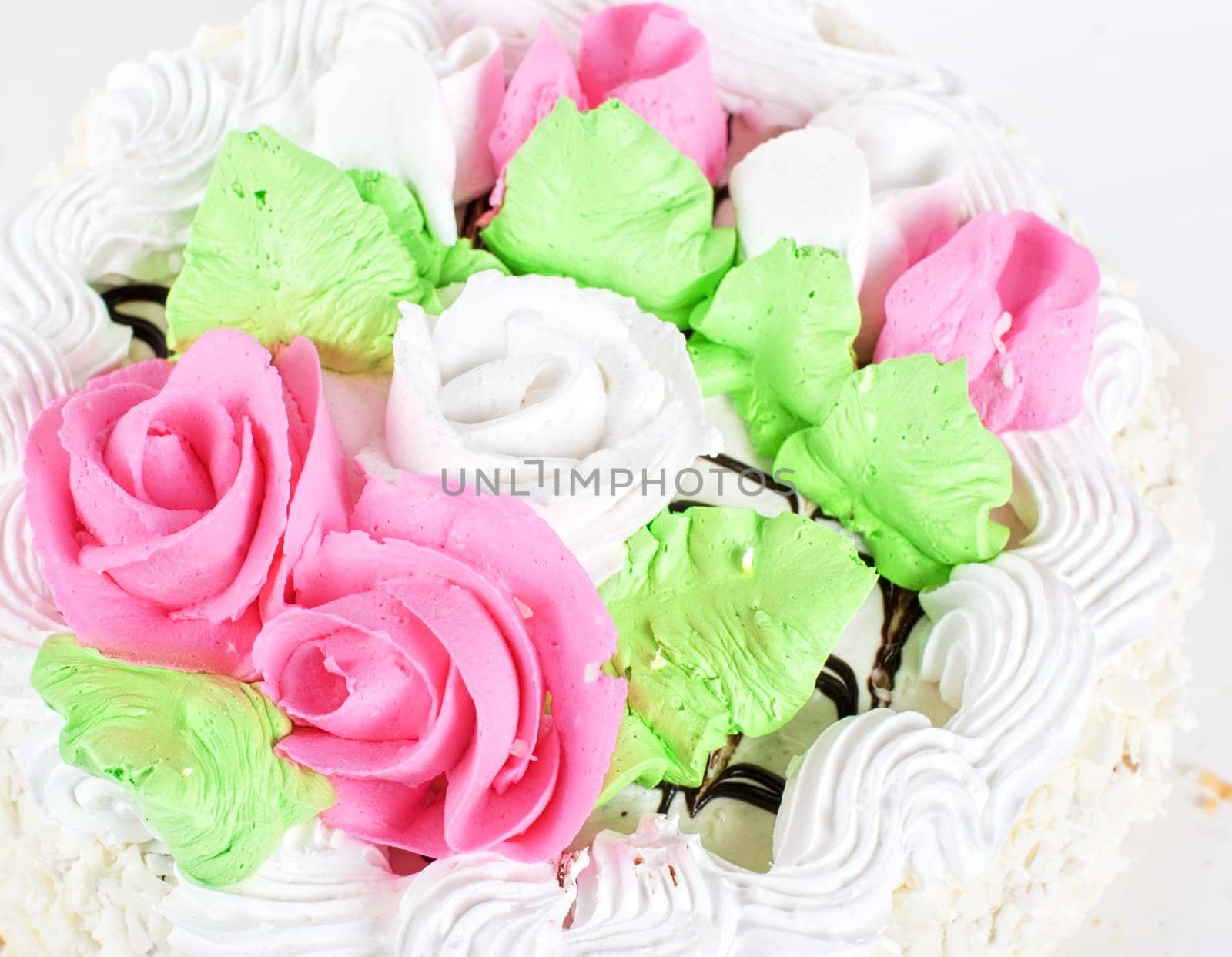cream cake closeup with cherry on a grey