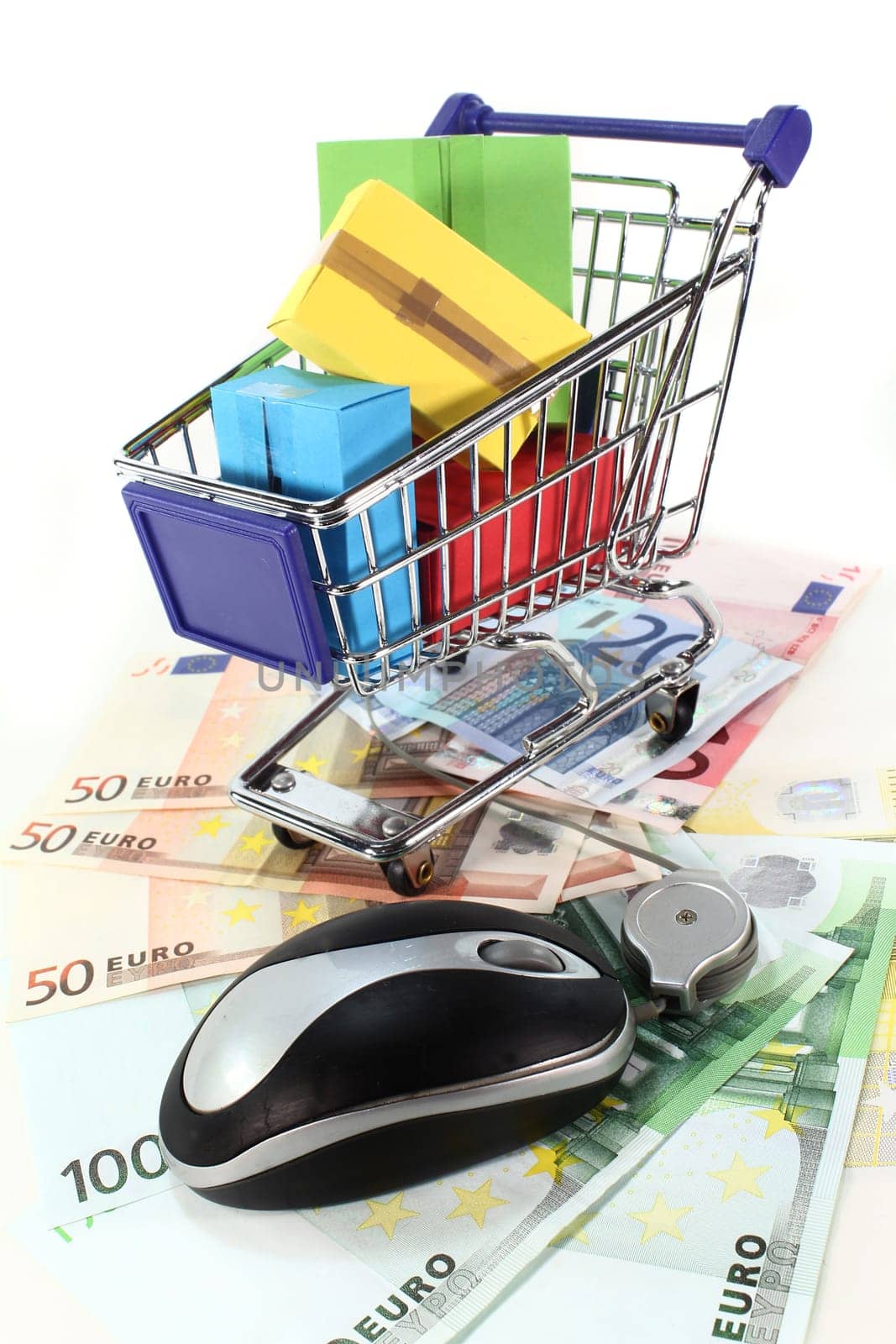 Shopping cart and euro bills against white background