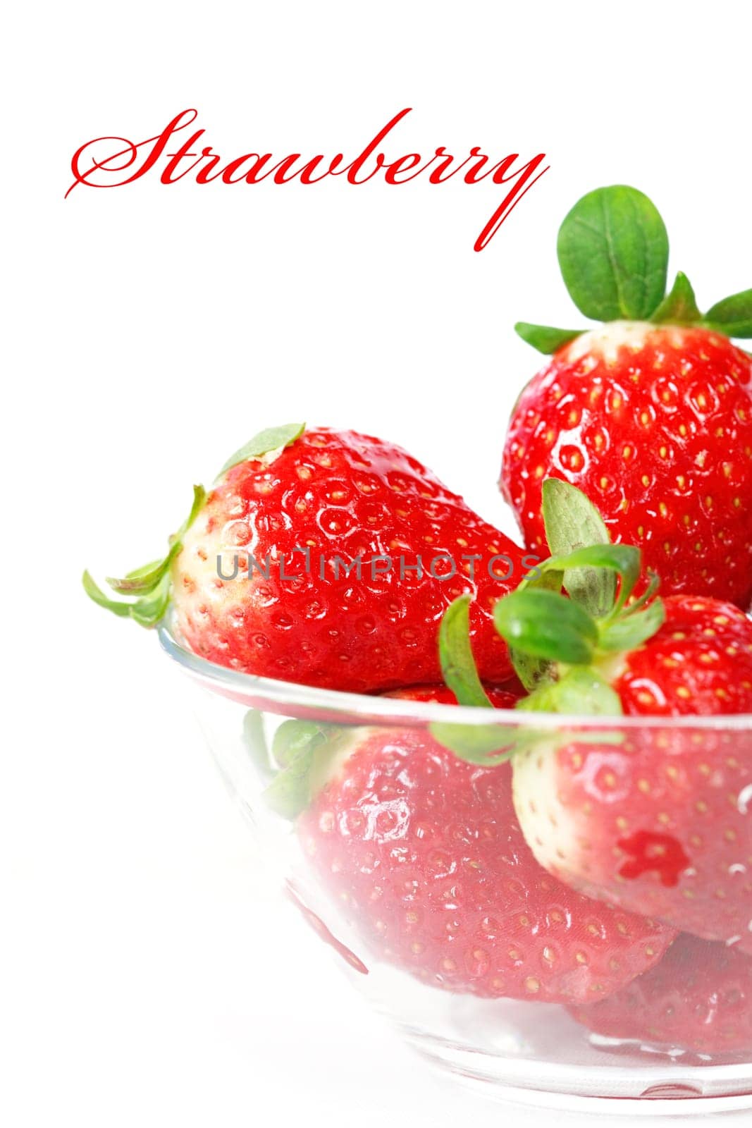 Strawberries in the bowl isolated