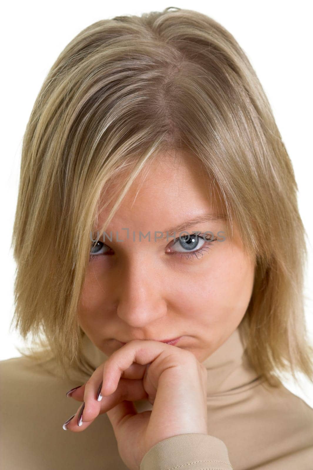 portrait on an unhappy blonde girl