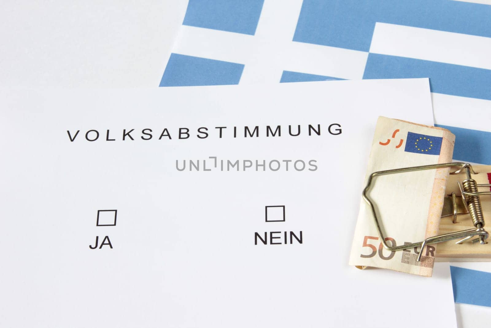 Symbolic photo: Referendum on debt relief for Greece,euro bill in a mousetrap