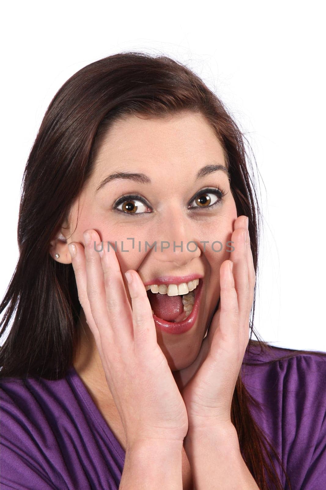 Gorgeous brunette woman with mouth open in surprise