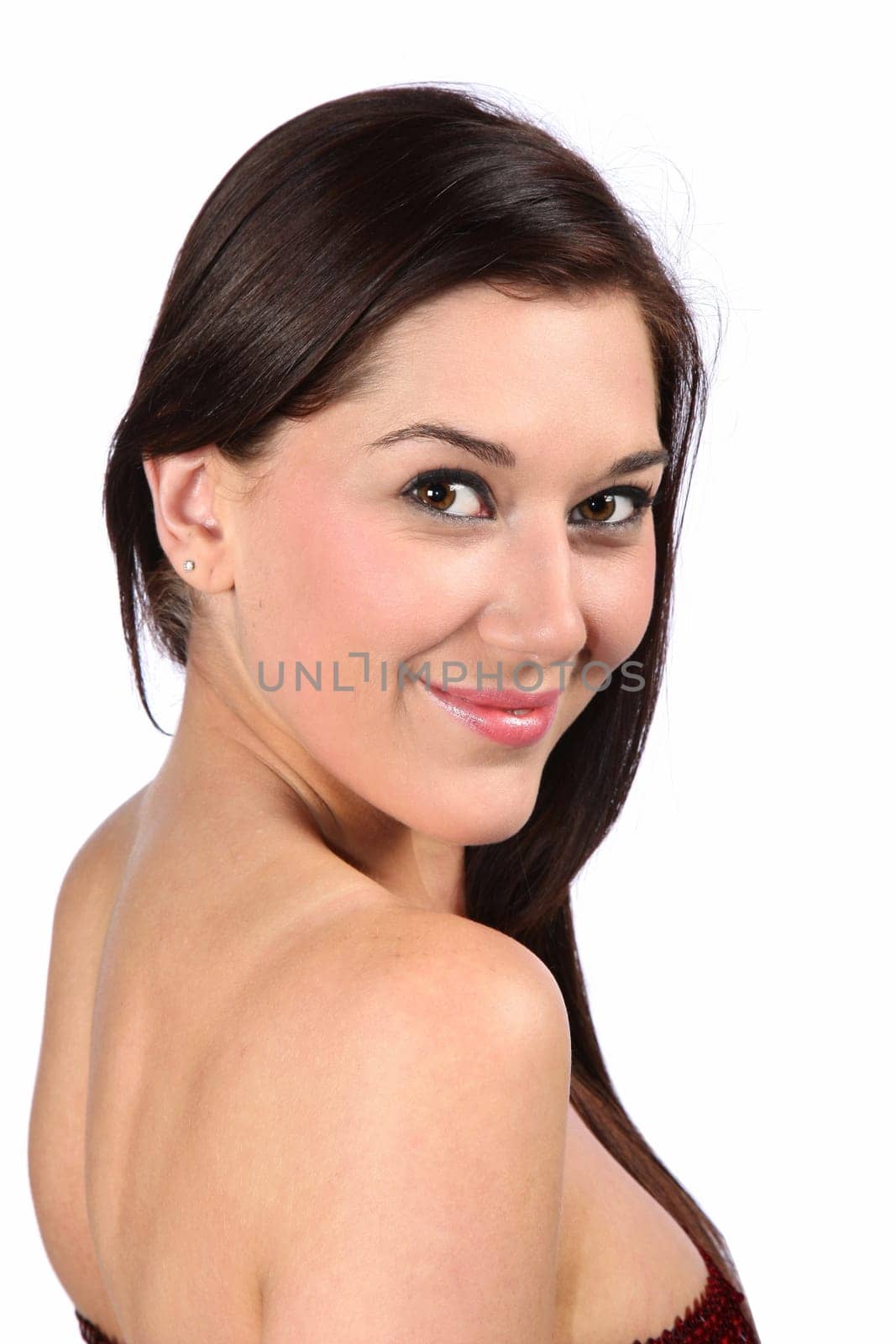 Lovely brunette smiling woman with bare shoulders